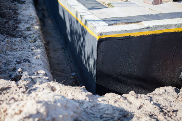 Professional Interior Drainage System technician working in Hartford, KY